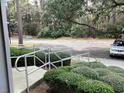 Well-maintained condo with nicely manicured bushes along the pathway at 409 Salt Marsh Circle # 20C, Pawleys Island, SC 29585
