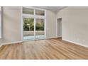 Bright living room featuring sliding glass doors leading to the backyard at 489 Rose Fountain Dr., Myrtle Beach, SC 29579
