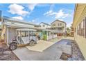 Home exterior with a golf cart and a covered outdoor area with seating at 6001-1592 South Kings Hwy., Myrtle Beach, SC 29575