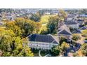 Beautiful aerial view of condos next to a lush golf course with nearby ponds and lakes at 679 Riverwalk Dr. # 202, Myrtle Beach, SC 29579