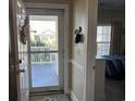 Inviting entryway with view to bedroom and patio, great natural light at 1000 Ray Costin Way # 114, Murrells Inlet, SC 29576
