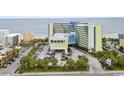 Aerial view of the Coral Beach Resort, landscaping, parking and the ocean at 1105 South Ocean Blvd. # 806, Myrtle Beach, SC 29577