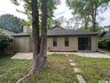 Backyard view with a small shed and a concrete patio at 116 Hickory Dr., Conway, SC 29526
