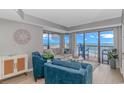 Bright living room showcases coastal style with ocean views and balcony access, offering seaside relaxation at 200 72Nd Ave. N # 501, Myrtle Beach, SC 29572
