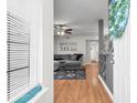 Inviting entryway featuring hardwood floors, and a modern decor at 2262 Andover Dr. # E, Surfside Beach, SC 29575