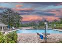 Inviting community pool area with comfortable lounge chairs, offering a refreshing escape and scenic views at 307 Golden Bear Dr. # 3, Pawleys Island, SC 29585