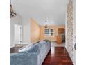 Inviting living room with hardwood floors and a decorative stone accent wall feature at 408 Chesterfield Ct., Myrtle Beach, SC 29577