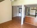 Living room area with appliances and laundry tucked away in closet at 500 Fairway Village Dr. # 6E, Myrtle Beach, SC 29588