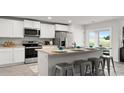 Well-equipped kitchen with stainless steel appliances and counter seating at 5153 Yellowstone Dr., Conway, SC 29526