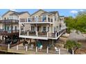 Inviting home featuring multiple balconies, outdoor dining, and entertainment space at 6001-308 South Kings Hwy., Myrtle Beach, SC 29575