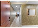 Inviting hallway view leading to the living area with a glimpse of the ocean view at 603 S Ocean Blvd. # 1205, North Myrtle Beach, SC 29582