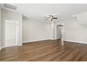 Open-concept living room featuring modern flooring, recessed lighting, and a ceiling fan at 605 Carter Reid Ct., Longs, SC 29568
