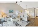 Cozy living room features vaulted ceilings, comfortable seating, and stylish decor at 6203 Catalina Dr. # 1832, North Myrtle Beach, SC 29582