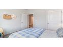 Bright bedroom with a full-sized bed and direct access to the hallway at 719 Chazen Way, Longs, SC 29568