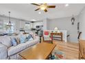 Inviting living room featuring hardwood floors, coastal decor, and an open floor plan at 820 Madiera Dr. # 14, North Myrtle Beach, SC 29582