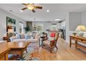 Bright and airy living room with comfortable seating, hardwood floors, and coastal decor at 820 Madiera Dr. # 14, North Myrtle Beach, SC 29582