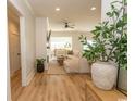 Inviting living room with hardwood floors and modern decor, creating a warm atmosphere at Simpson Creek Dr., Loris, SC 29569