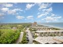 Ocean view condo community near the beach, with lush landscaping and mature trees at 5523 N Ocean Blvd. # 1201, Myrtle Beach, SC 29577