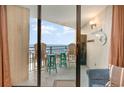 Relaxing ocean view from a private balcony furnished with table and chairs at 5523 N Ocean Blvd. # 1201, Myrtle Beach, SC 29577