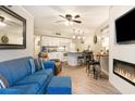 Comfortable living room with a modern fireplace, and access to a fully equipped kitchen at 5523 N Ocean Blvd. # 1201, Myrtle Beach, SC 29577