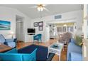 Cozy living room with bright decor, seamlessly connected to the dining area at 6001- 1776 S Kings Highway, Myrtle Beach, SC 29575