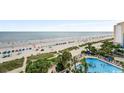 Gorgeous aerial view of pristine beach access and ocean front pool at 1105 S Ocean Blvd. # 630, Myrtle Beach, SC 29577