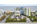 Stunning aerial view of the Coral Beach Resort, showcasing ocean access, and ample parking at 1105 S Ocean Blvd. # 630, Myrtle Beach, SC 29577