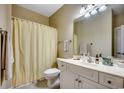 Bathroom with a shower-tub combo, vanity sink, and neutral-toned walls at 116 Cypress Point Ct. # 302, Myrtle Beach, SC 29579
