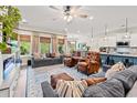 Spacious living room with hardwood floors, plenty of natural light and an open concept layout at 127 Emerald Rush Ct., Longs, SC 29568