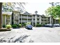 View of the condominiums with parking and landscaped grounds at Lighthouse Point Villas at 1401 Lighthouse Dr. # 4226, North Myrtle Beach, SC 29582