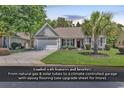 Attractive single-Gathering home with a manicured lawn, mature trees, and a welcoming facade at 156 Summerlight Dr., Murrells Inlet, SC 29576