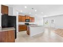 Stylish kitchen with granite countertops, stainless steel appliances, an island and an open layout at 4009 Alvina Way, Myrtle Beach, SC 29579