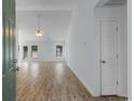Bright open-concept living space with high ceilings, hardwood floors, and ample natural light at 4591 Hidden Creek Ln., Myrtle Beach, SC 29579