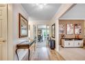 Elegant foyer with hardwood floors and views into the dining area at 8209 Timber Ridge Rd., Conway, SC 29526