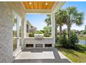 An outdoor kitchen features a grill, countertop, and storage at 985 Shipmaster Ave., Myrtle Beach, SC 29579
