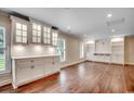 Bright living space with built-in cabinets and hardwood flooring at 107 Azalea Dr., Conway, SC 29526