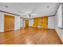 Spacious room with hardwood floors and built-in shelving, perfect for entertaining or relaxation at 1907 Rose St., Conway, SC 29527