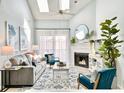 Bright living room with vaulted ceilings, fireplace and decor at 201 N Hillside Dr. # 311-A, North Myrtle Beach, SC 29582