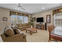 Inviting living space featuring cozy sofas, rattan accents, and natural lighting at 215-B S Dogwood Dr., Surfside Beach, SC 29575