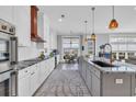 Open kitchen with a central island, modern appliances, and hardwood flooring at 260 Palmetto Harbour Dr., North Myrtle Beach, SC 29582