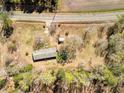 Aerial view of the property showcasing its rural setting and surrounding landscape at 2917 Chippenham Rd., Marion, SC 29571