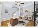 Modern office space with wood floors, a stylish desk, and elegant decor at 3550 Pampas Dr. # 2, Myrtle Beach, SC 29577