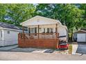 Charming coastal home featuring a spacious wooden deck and a cozy, inviting atmosphere with great views at 6001 - 1433A S Kings Hwy., Myrtle Beach, SC 29575