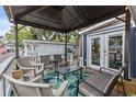 Relaxing outdoor living space featuring a covered patio with comfortable seating and stylish decor at 6001- 1771 S Kings Highway, Myrtle Beach, SC 29575