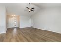 Spacious living room with vaulted ceiling and hardwood floors at 1013 Woodside Dr., Conway, SC 29526