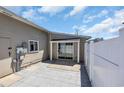 The backyard patio has a paved area and a white fence to ensure privacy at 1361 Turkey Ridge Rd. # C, Surfside Beach, SC 29575
