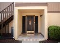 Inviting front entryway with a decorative 'welcome' door and tiled flooring, creating a warm first impression at 501 44Th Ave. N # D 9, Myrtle Beach, SC 29577