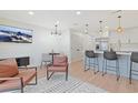 Inviting living room view featuring modern furnishings and an open layout to the kitchen at 205 Double Eagle Dr. # C-2, Myrtle Beach, SC 29575