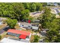 Aerial view of mobile home with red pin, surrounded by trees, with nearby construction site at 2706 Willow St., North Myrtle Beach, SC 29582