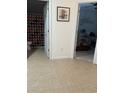 Hallway with tile flooring with views of bathroom and main bedroom at 307 Black Oak Ln. # 102, Murrells Inlet, SC 29576